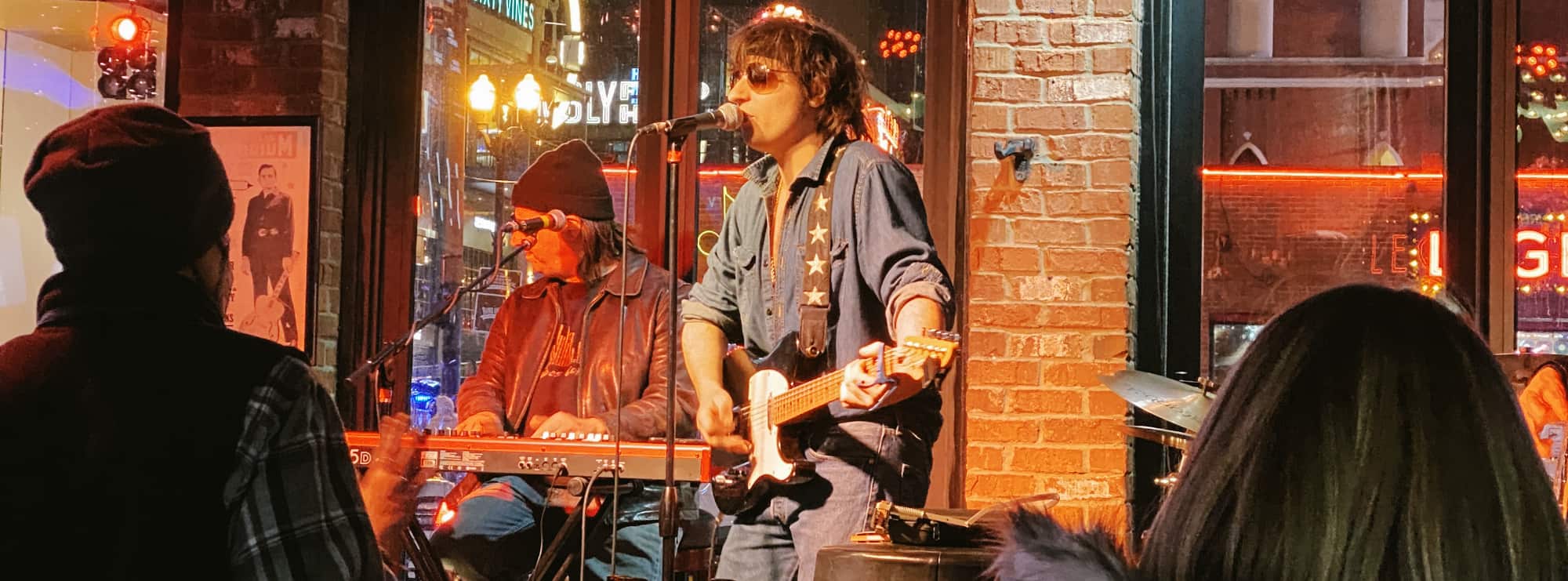 bar singer on guitar in Savannah