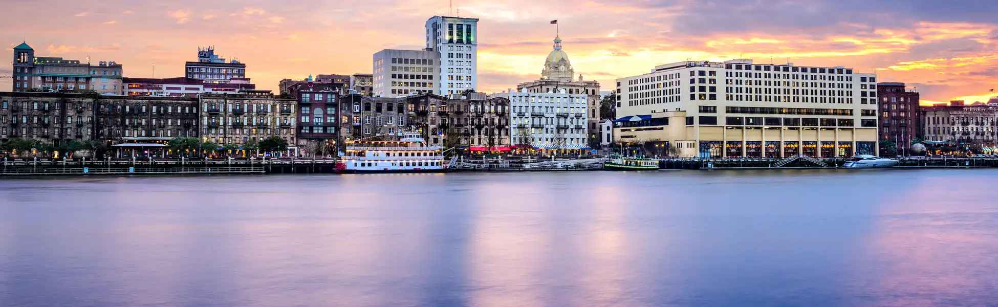Neon color image of a band playing and people singing along