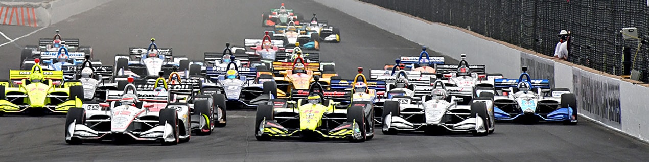 indy cars racing to through the start line Savannah
